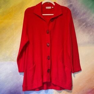 Habitat "To Live In" Coral Cardigan, a collared, long-sleeve knit sweater.